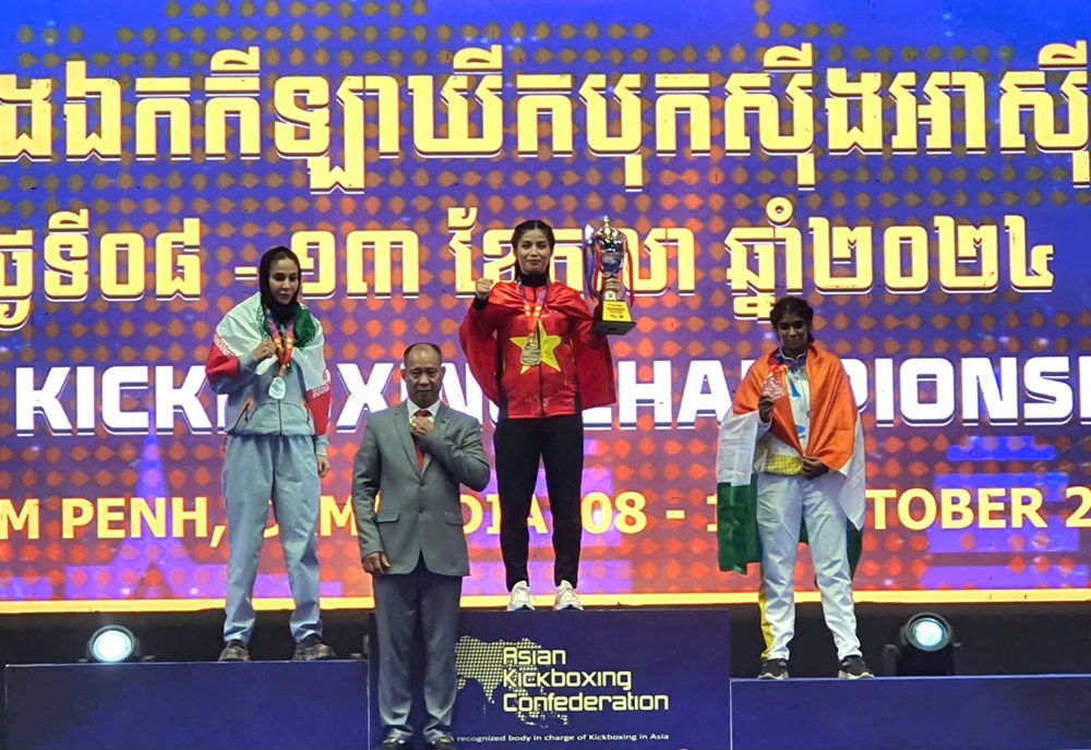 Phùng Thị Hồng Thắm mang về tấm HCV châu Á thứ 11 cho Kickboxing Việt Nam - ảnh 2