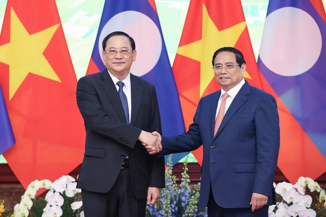 Thủ tướng Phạm Minh Chính làm việc với Thủ tướng Lào Sonexay Siphandone - ảnh 1