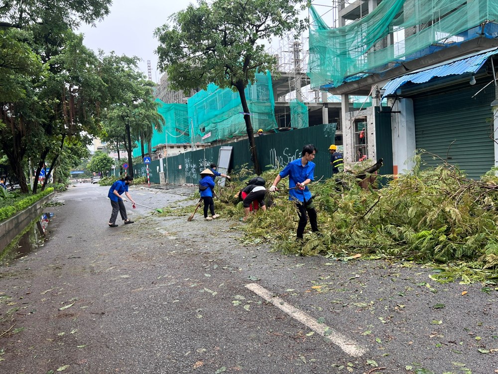 Huy động tổng lực các lực lượng dọn dẹp phố phường Thủ đô - ảnh 7